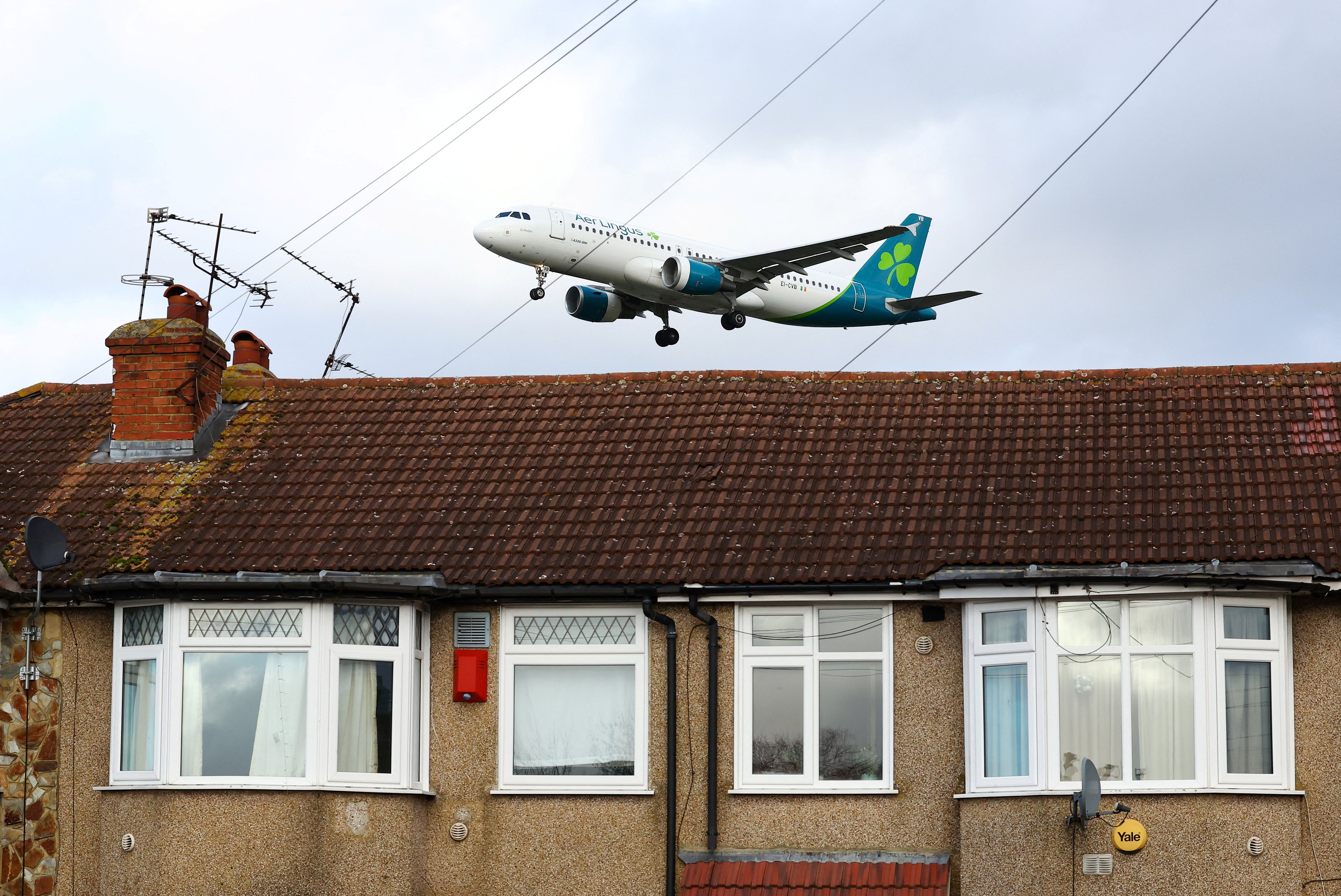 An Aer Lingus plane lands at Heathrow during Storm Isha