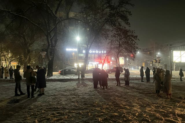 <p>File. People gather in a street in Almaty, Kazakhstan</p>