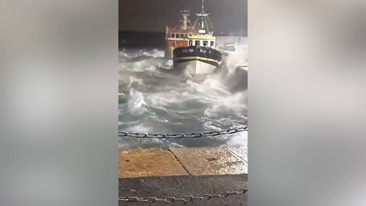 Rough seas rock boats in Dun Laoghaire harbour as Storm Isha hit the UK on Monday