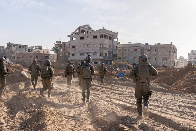 <p>Israeli soldiers operate in the Gaza Strip as the conflict continuesbetween Israel and the Palestinian Islamist group Hamas</p>