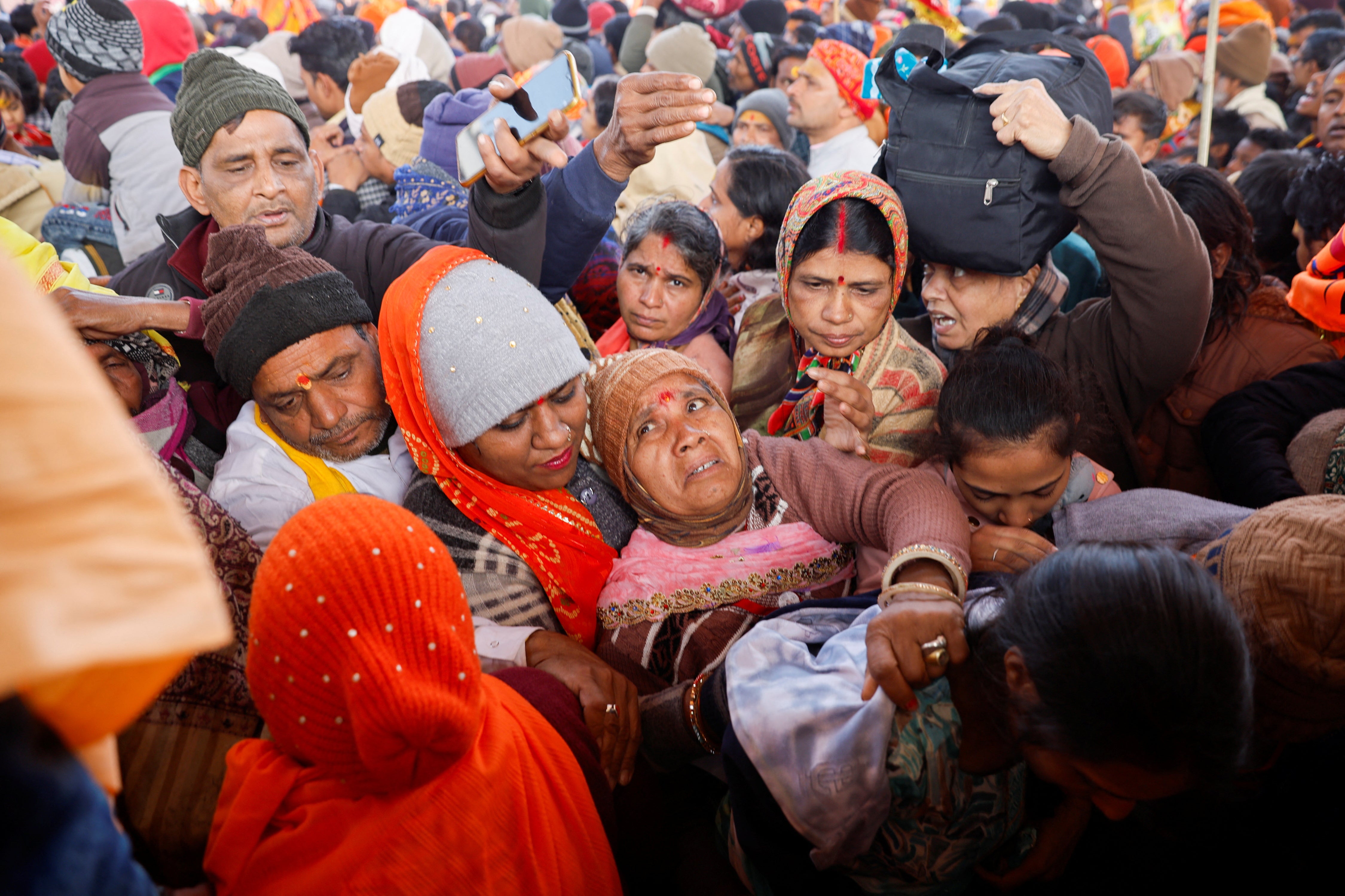 Some devotees fell during the surge of people trying to get inside
