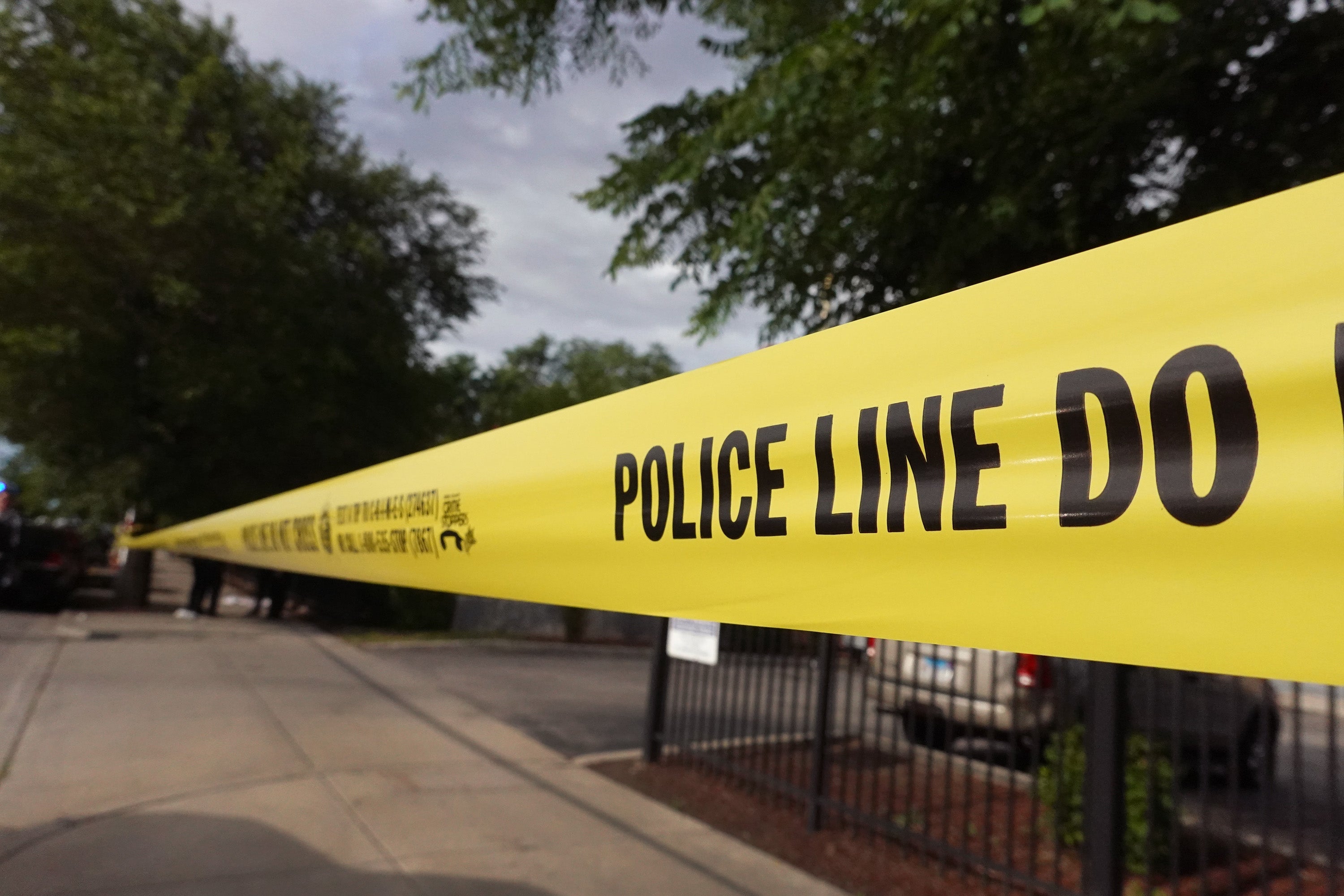 File: Police tape surrounding a crime scenes in Chicago, Illinois