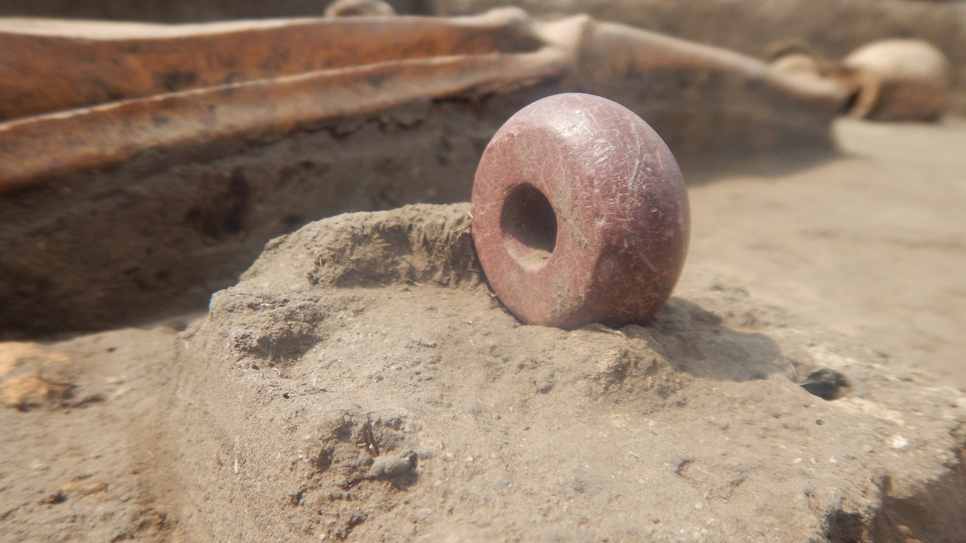 Archaeologists also found a stone altar, as well as bracelets and beads