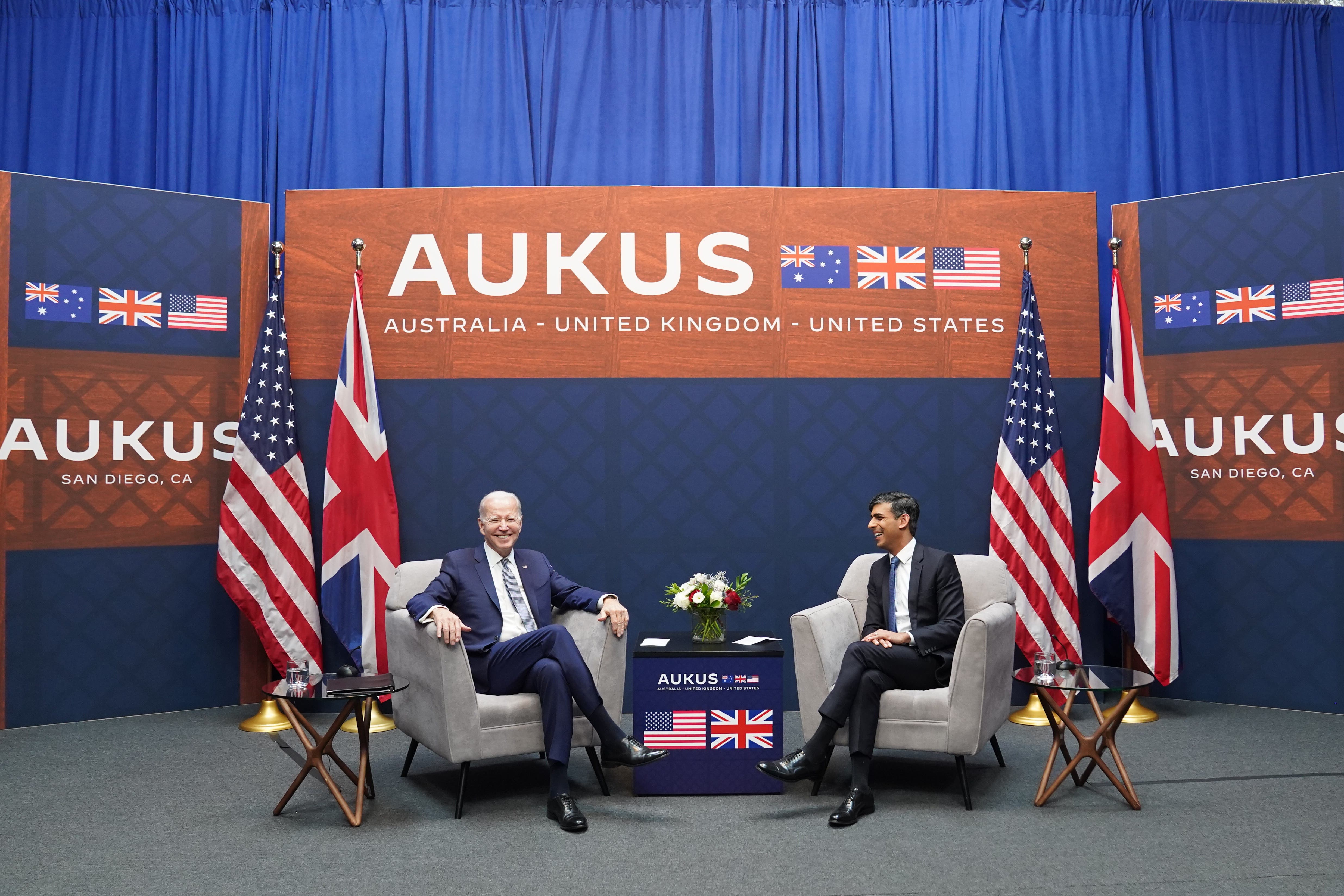 Prime Minister Rishi Sunak and US President Joe Biden discuss the Aukus pact (PA)