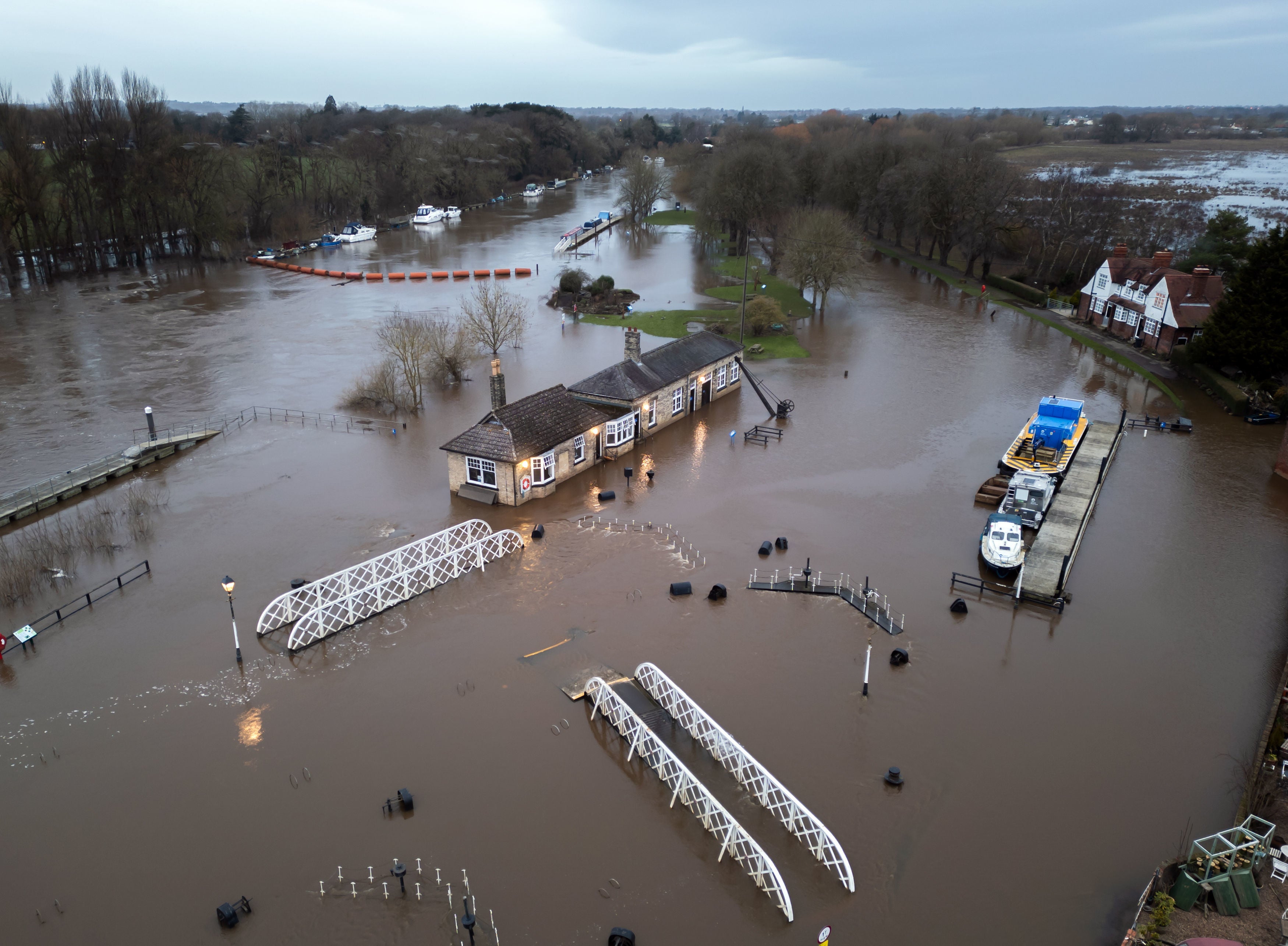 More than 100 flood warnings and alerts remain in place across the UK, as flooding is still present in parts of York and thousands remain affected by power cuts