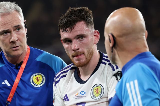 <p>Andy Robertson faces a lay-off with a shoulder injury while playing for Scotland (Isabel Infantes/PA)</p>