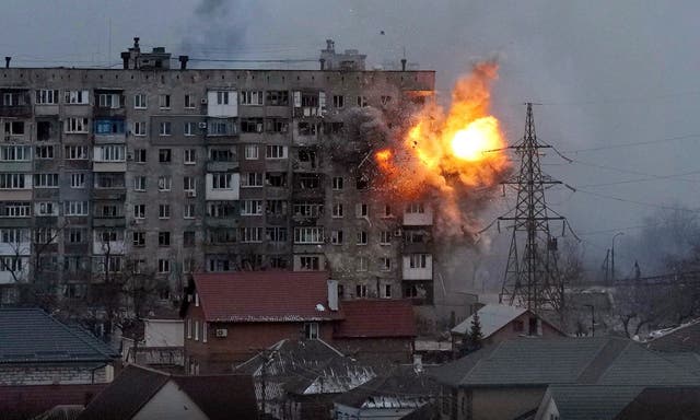 <p>An explosion erupts from an apartment building after a Russian army tank fired on it in Mariupol, Ukraine</p>