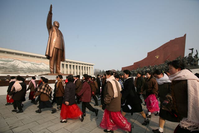<p>North Koreans visit a monument for Kim Il Sung in Pyongyang, North Korea on Tuesday, Feb. 26, 2008.</p>