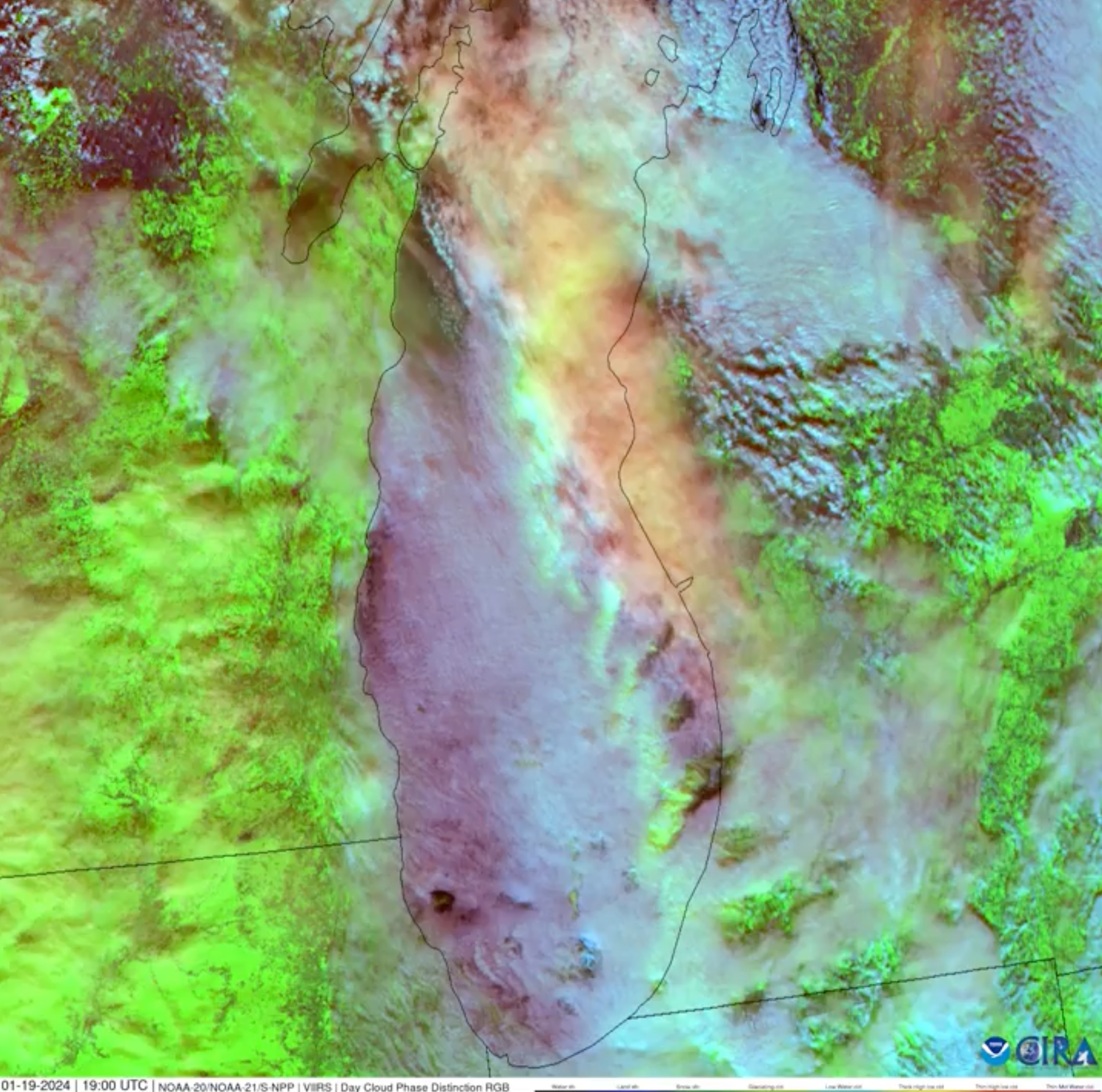<p>This satellite imagery shows a braided band of mesovortices highlighted in pale green over Lake Michigan</p>