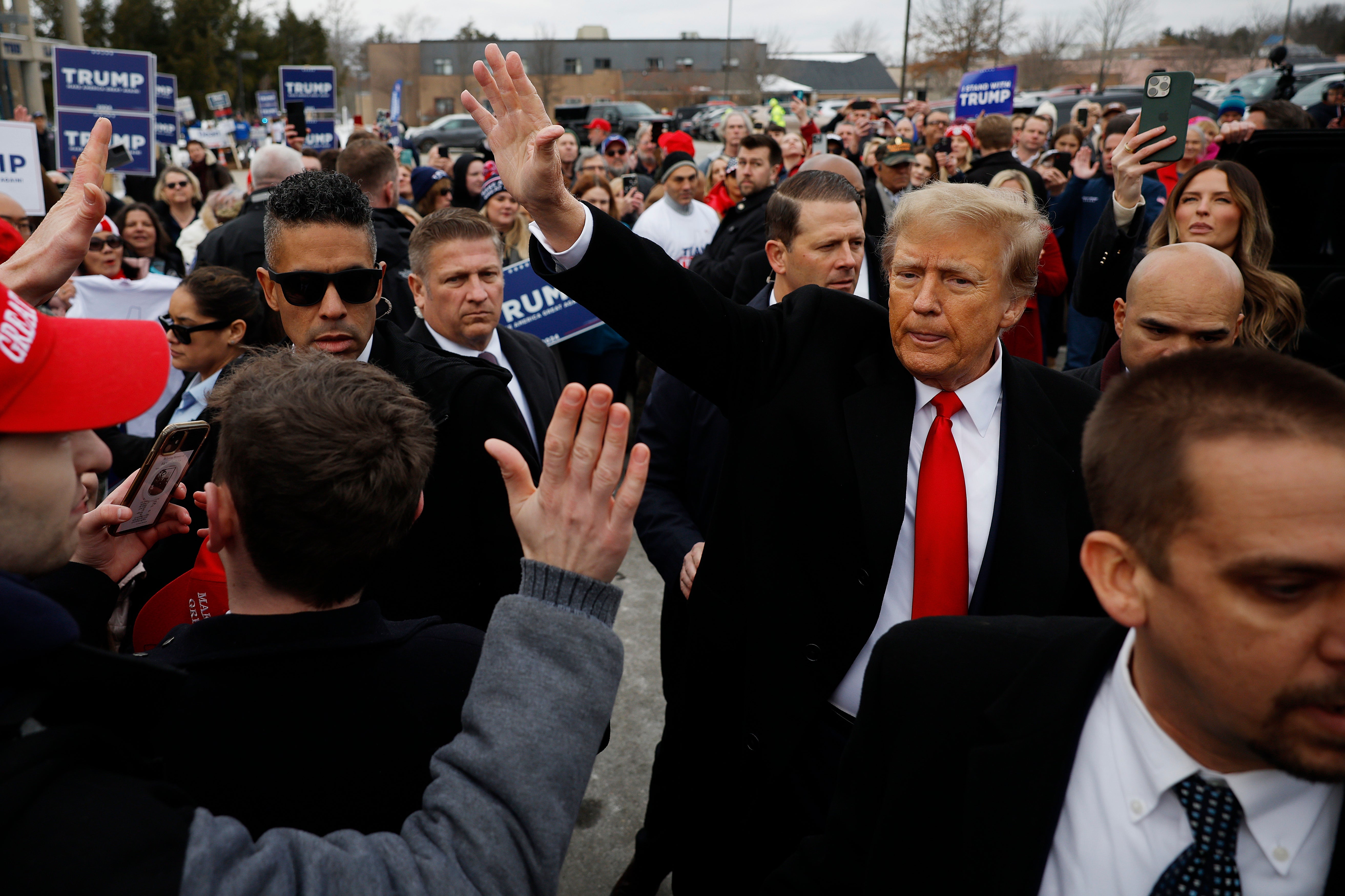 Republican presidential candidate, former U.S. President Donald Trump visits a polling site at Londonderry High School on primary day, on January 23, 2024 in Londonderry, New Hampshire.