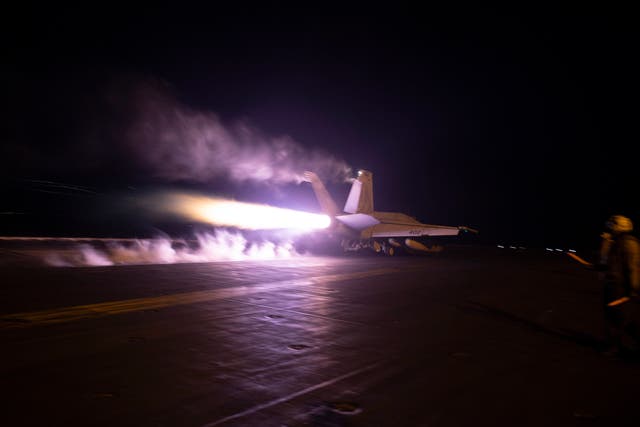<p>A handout photo made available by the US Navy shows an aircraft launching from USS Dwight D Eisenhower (CVN 69) during flight operations in response to increased Houthi activities in the Red Sea, 22 January 2024</p>
