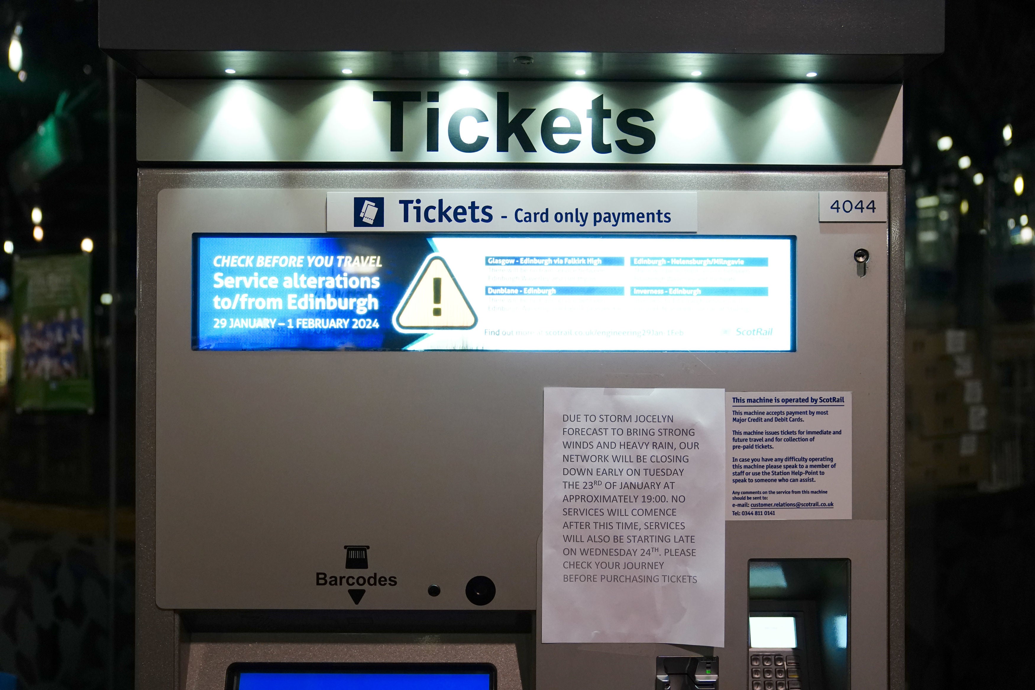 A sign on a ticket machine at Edinburgh Waverley train station as rail services to and from Scotland have been suspended until at least noon on Wednesday