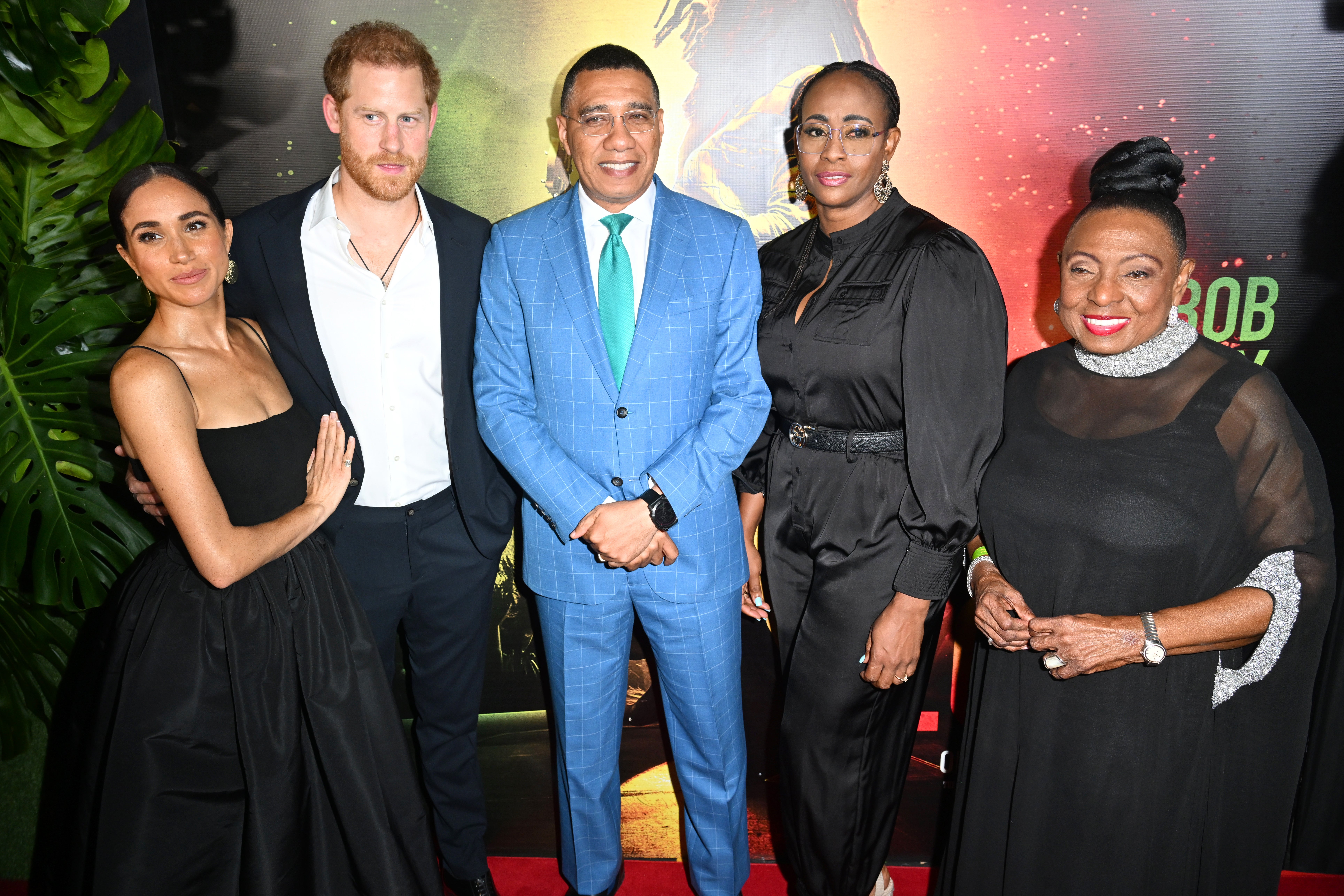 Meghan, Harry, Andrew Holness, Juliet Holness and Olivia Grange at the Carib Theatre