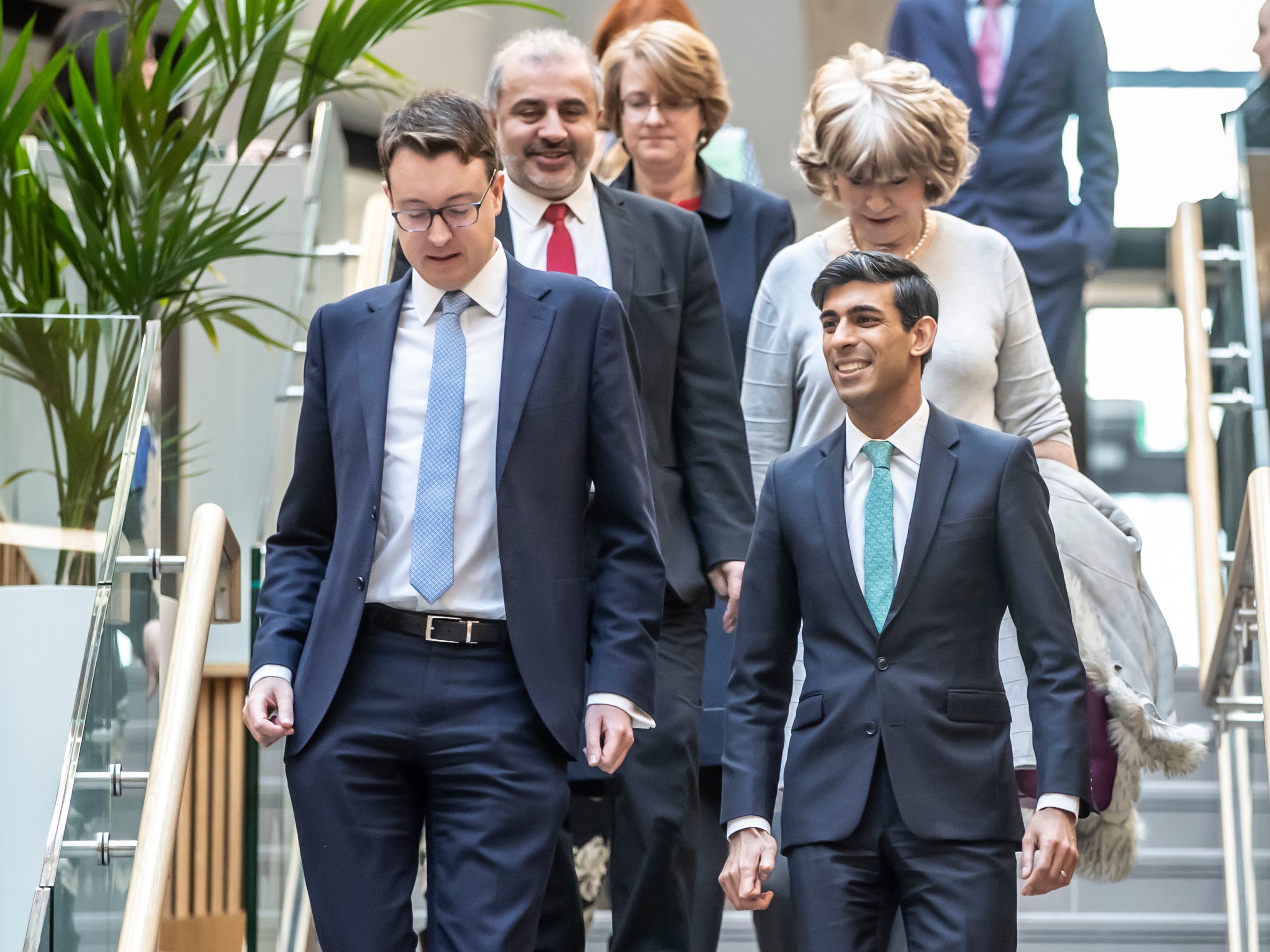 Rishi Sunak with Simon Clarke MP (left) during a visit to the Nexus Building at the University of Leeds