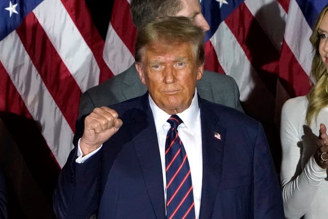 <p>Republican presidential hopeful and former US President Donald Trump gestures during an Election Night Party in Nashua, New Hampshire, on January 23, 2024. </p>