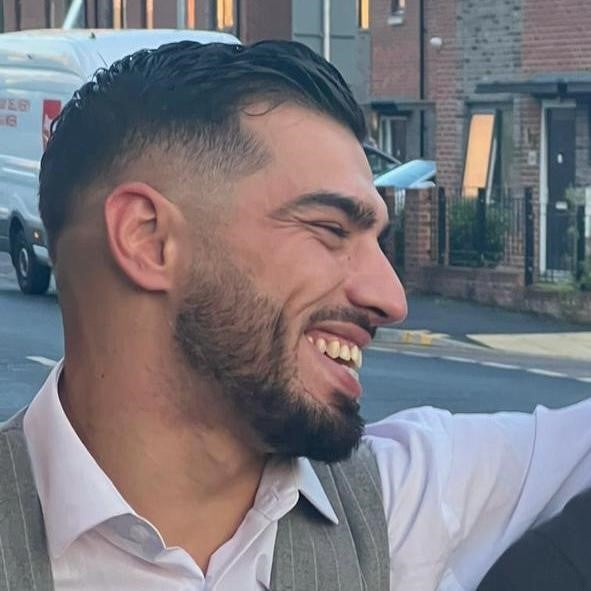 Family and friends have paid tribute to a man who was killed in an altercation at traffic lights in Manchester