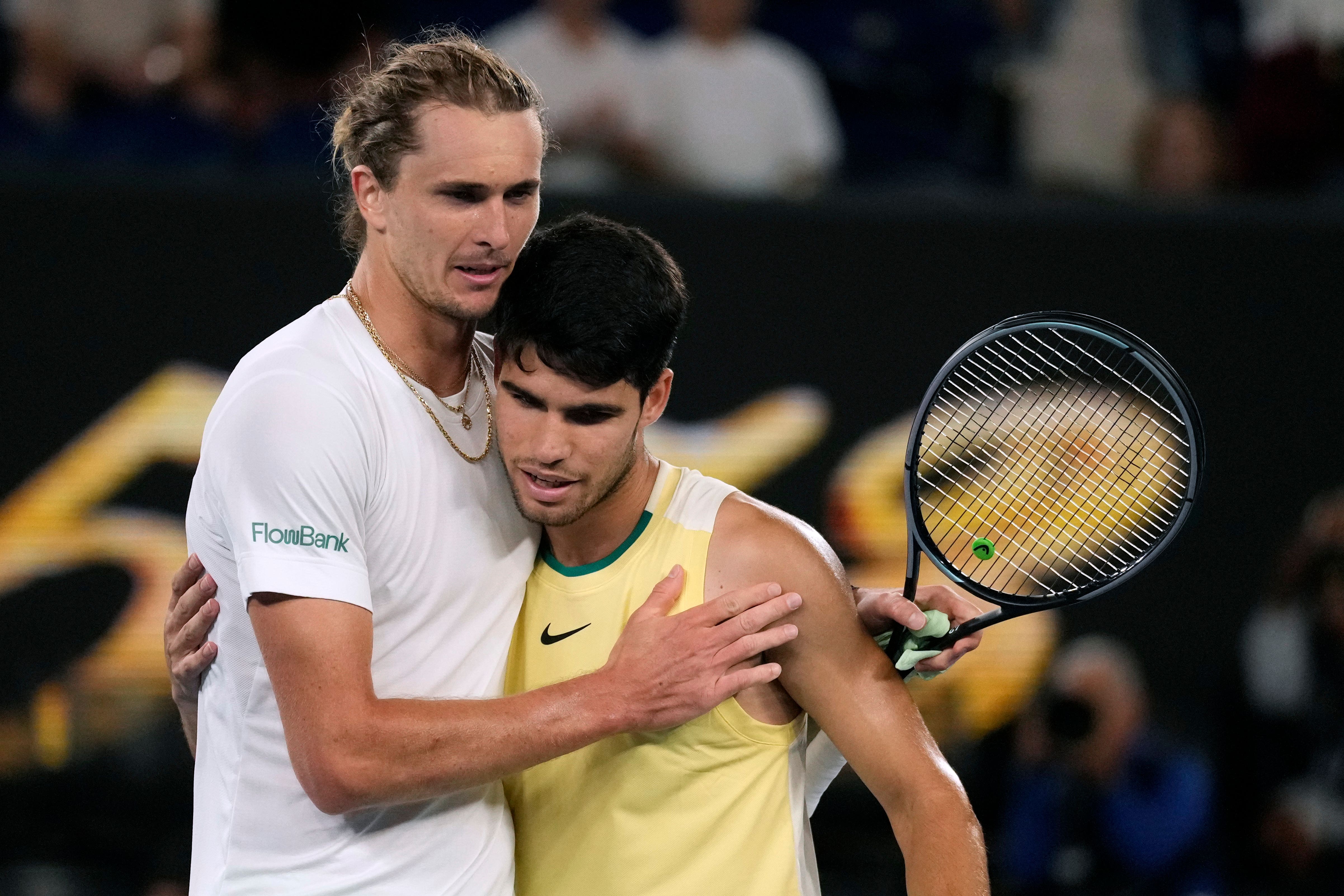 Alexander Zverev, left, embraces Carlos Alcaraz after this year’s Australian Open quarter-final