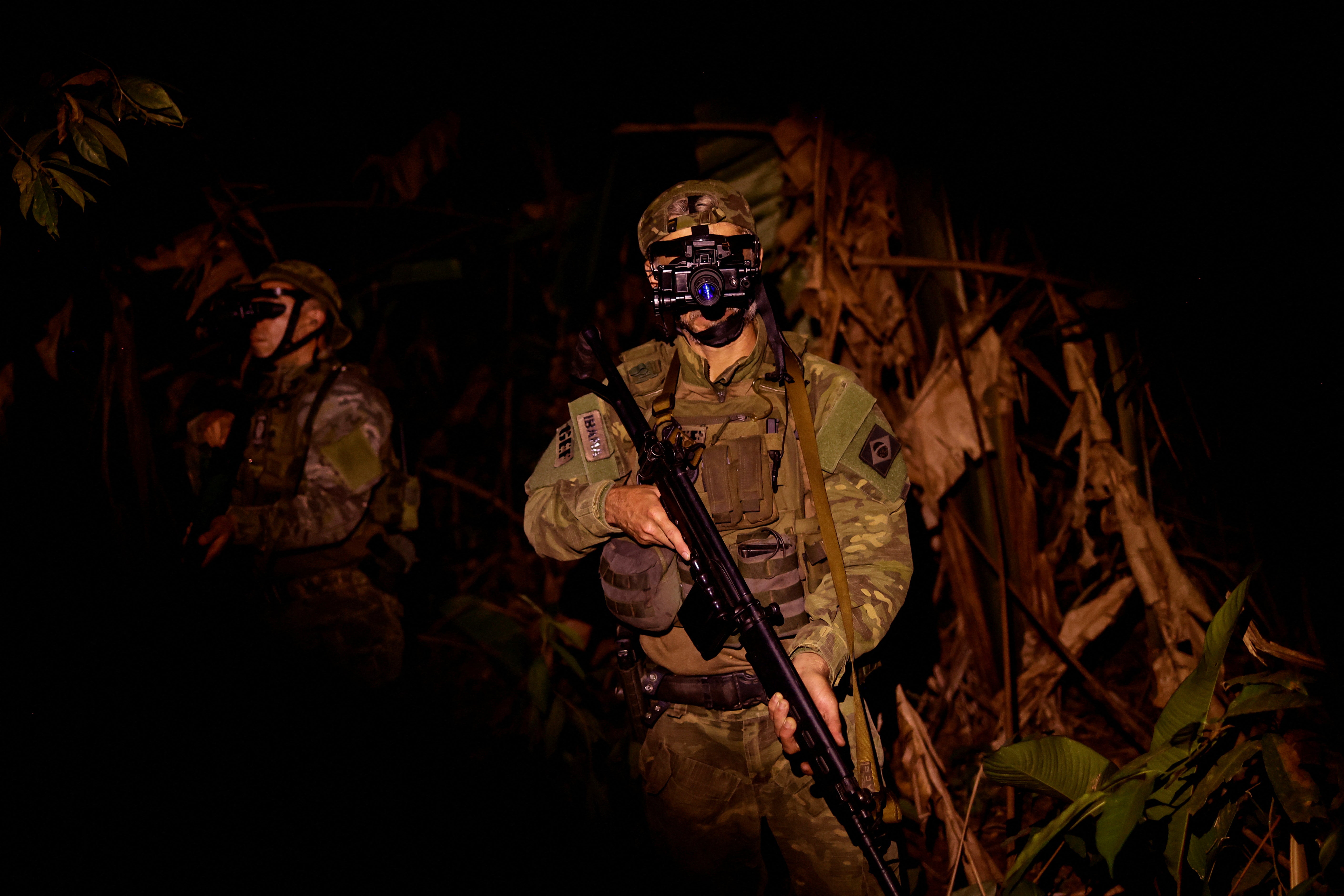 Ibama inspectors use night vision goggles during an operation against illegal mining