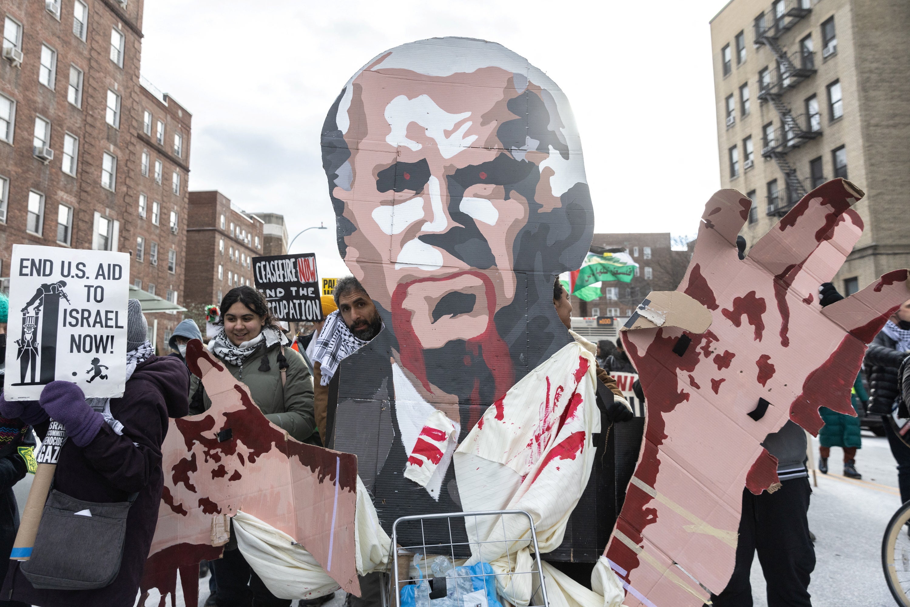 Demonstrators take part in the ‘Biden: stop supporting genocide!" rally in New York City on 20 January