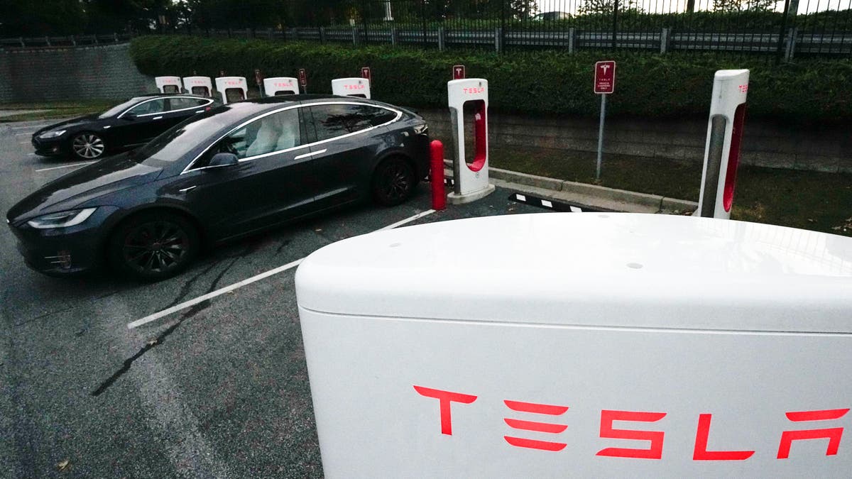 Tesla 4Q earnings fall short of analyst estimates as company warns of lower sales growth this year 