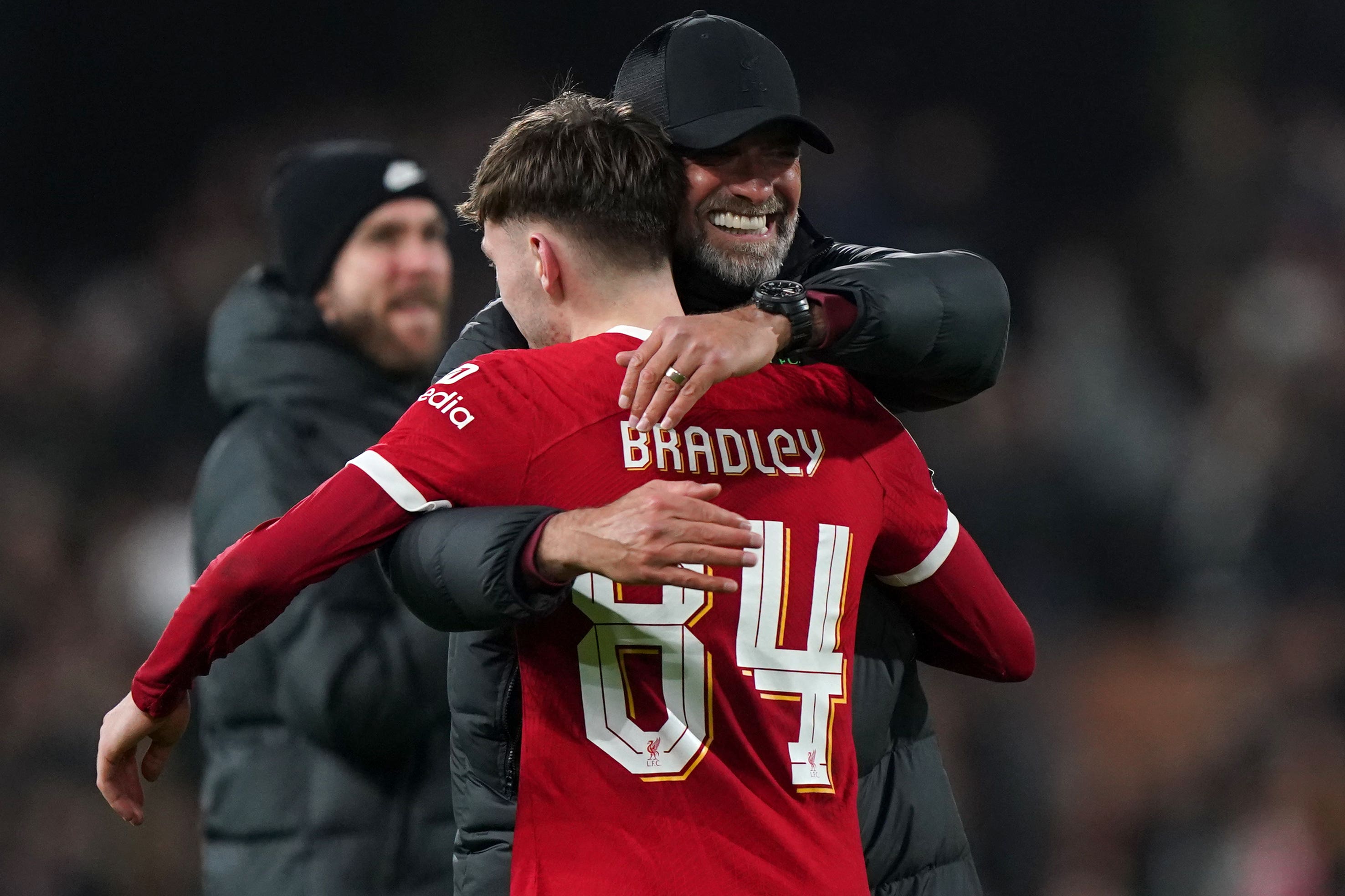 Jurgen Klopp embraces Conor Bradley (Bradley Collyer/PA)