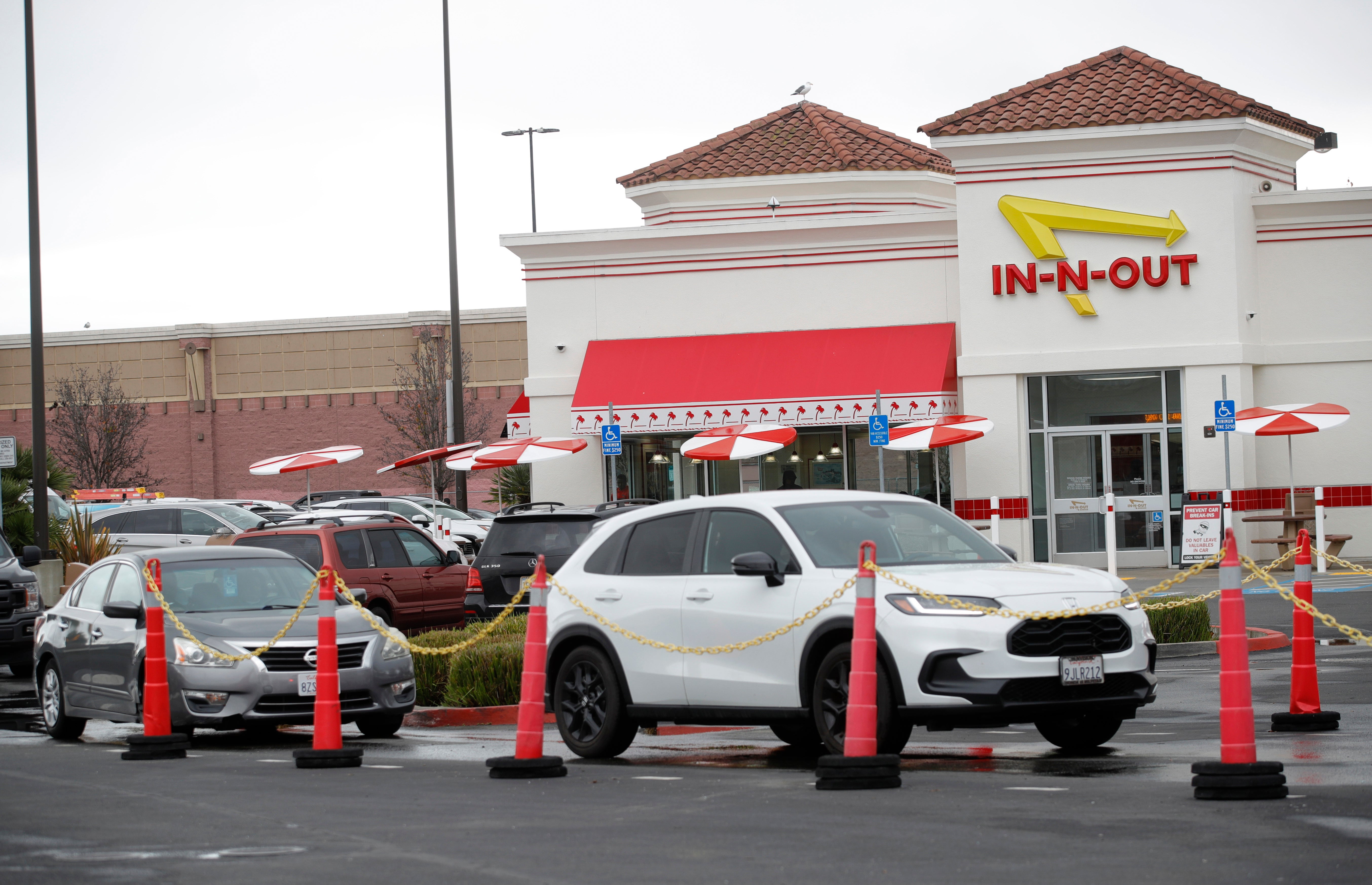 Americans are eating fast food less due to inflation-driven rising costs of meals paired with financial strain (stock image)