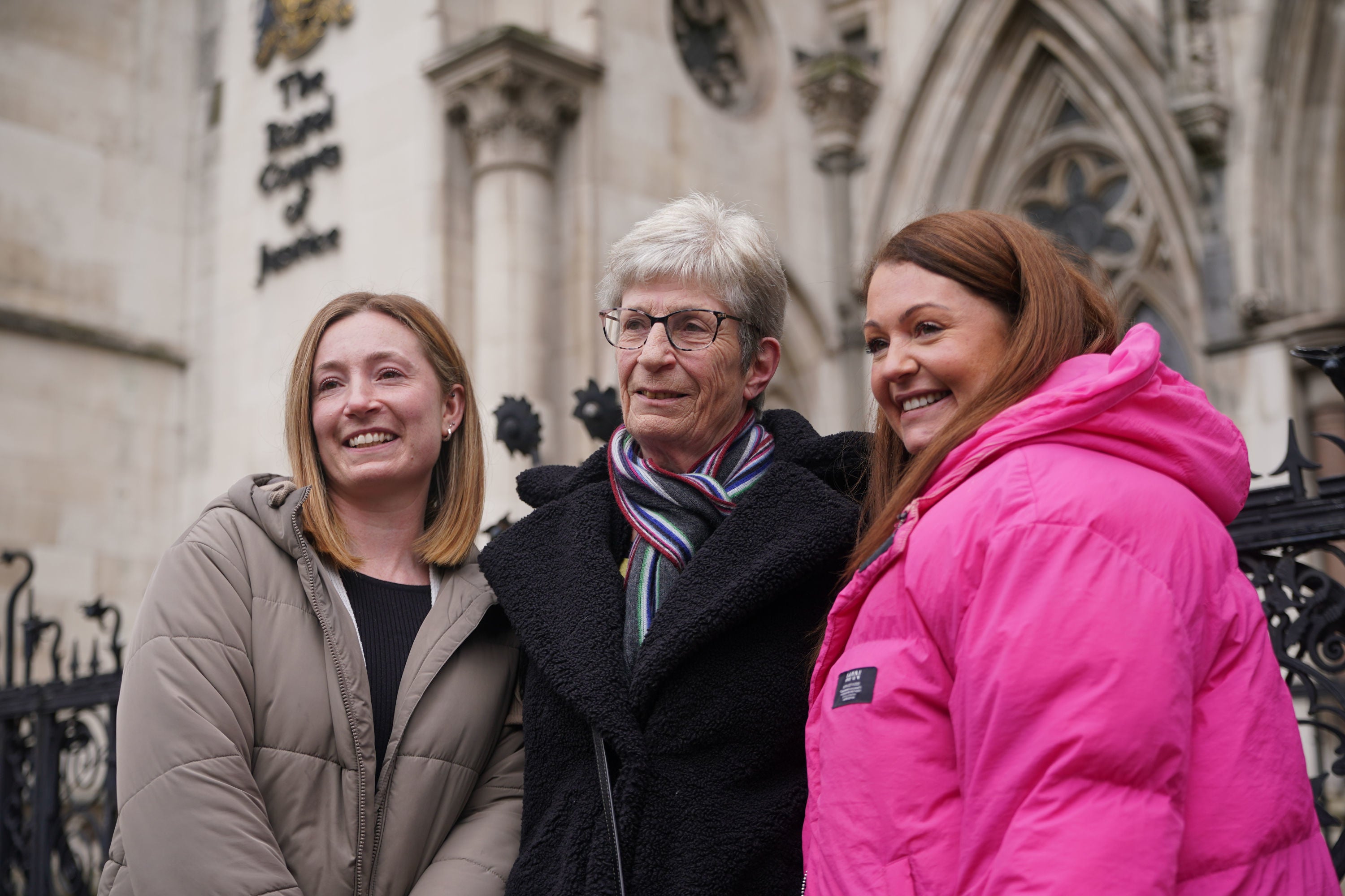 Former subpostmistress Kathleen Crane (centre) outside the Royal Courts of Justice in London after judges quashed her fraud conviction