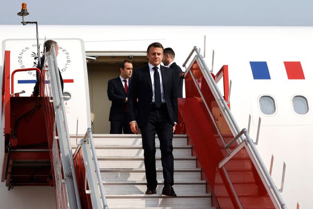 <p>France's president Emmanuel Macron deplanes upon his arrival at Jaipur international airport</p>