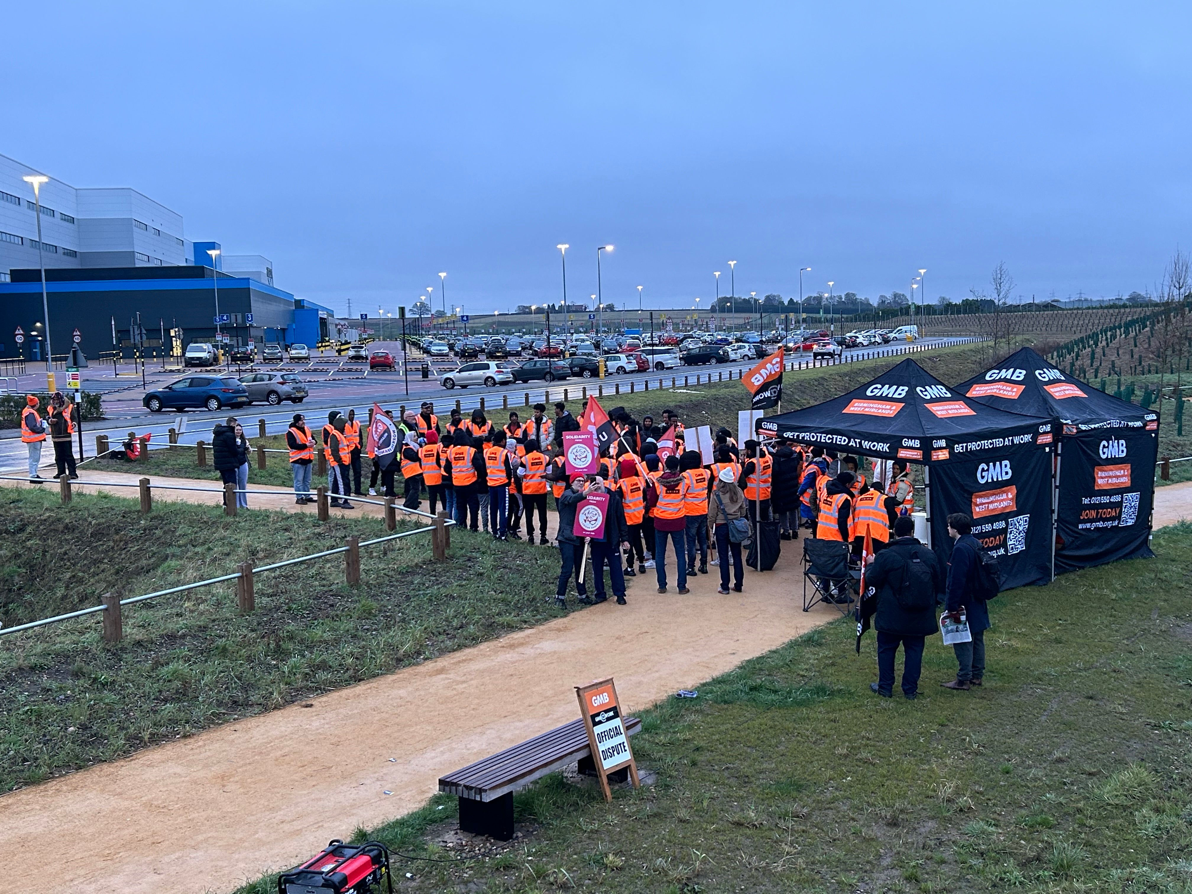 Amazon workers gather to strike against pay and working conditions