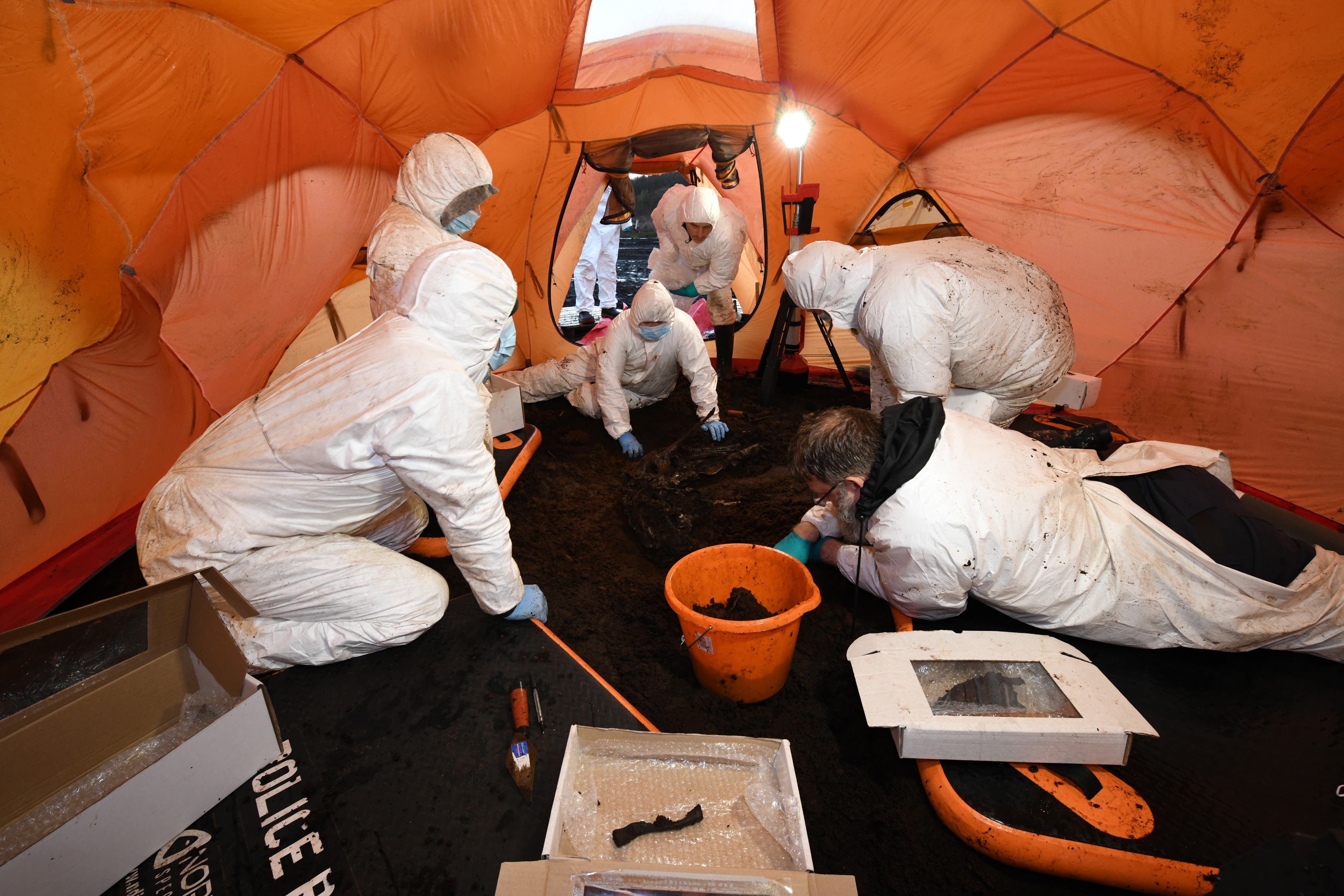 Archaeologists from the PSNI’s body recovery team at the site in Bellaghy, Co Londonderry (PSNI/PA)