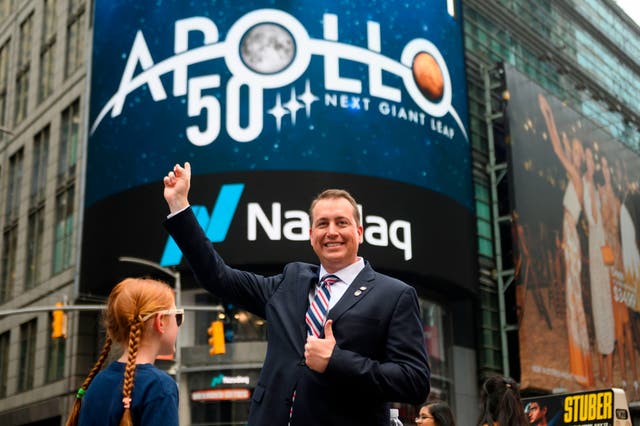 <p>Jeff DeWit poses during the Nasdaq Stock Market closing bell ceremony in New York City on 19 July 2019 during his time as NASA’s Chief Financial Officer</p>