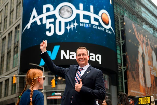 <p>Jeff DeWit poses during the Nasdaq Stock Market closing bell ceremony in New York City on 19 July 2019 during his time as NASA’s Chief Financial Officer</p>