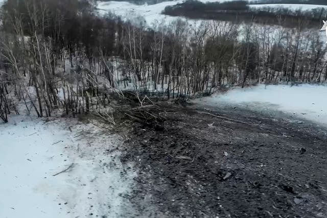 <p>In this photo taken from video released by Russian Investigative Committee, wreckage of the Il-76 is seen near Yablonovo, Belgorod </p>
