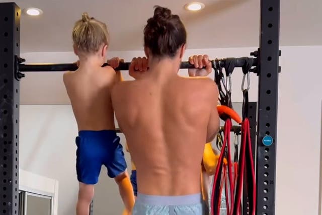 <p>Joe Wicks shares video of three-year-old son balancing on barbell and doing chin-ups.</p>