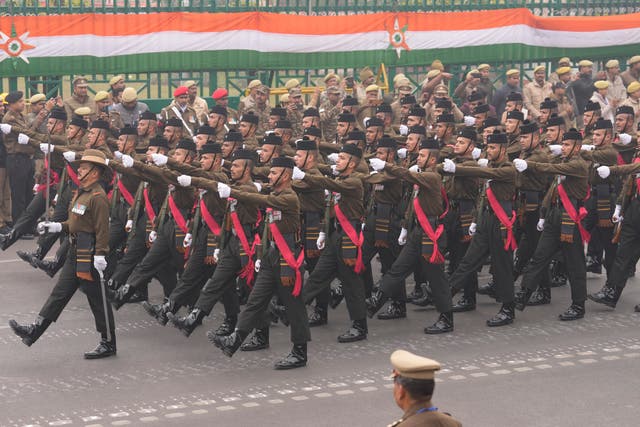 <p>Indian army soldiers march in front of the Vidhan Sabha during the Republic Day parade in Lucknow, capital of northern Indian state of Uttar Pradesh, Friday, 26 January 2024</p>