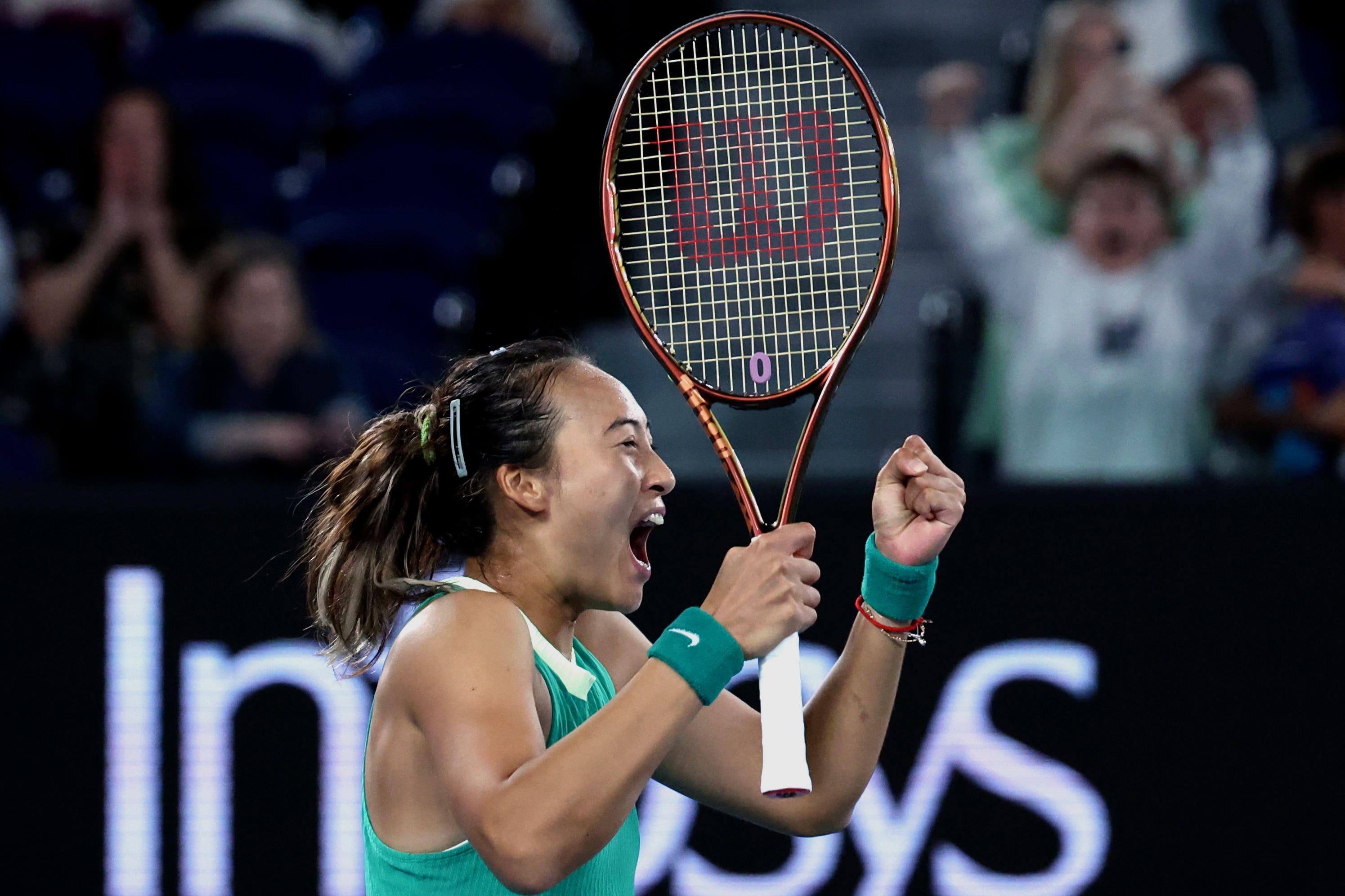 Zheng Qinwen celebrates reaching the Australian Open final (Asanka Brendon Ratnayake/AP)