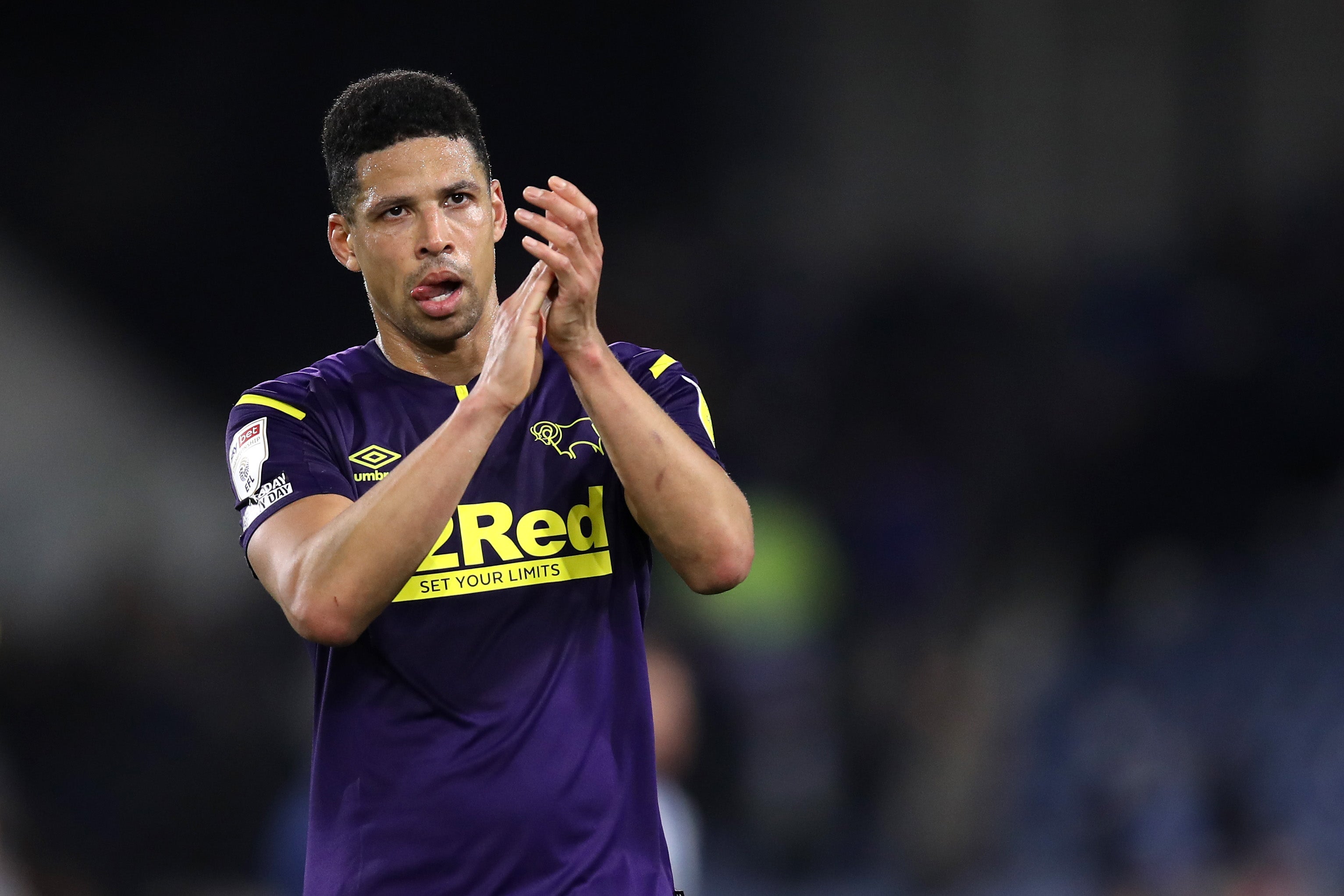 Curtis Davies of Derby County applauds the fans in 2022