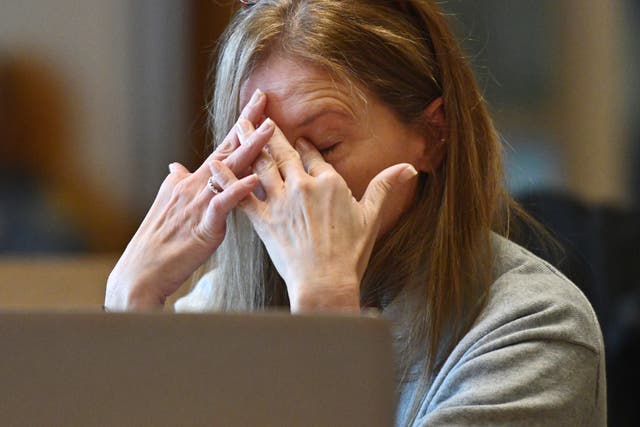 <p>Michelle Troconis sheds a tear as her first interview with Connecticut State Police is presented as evidence </p>