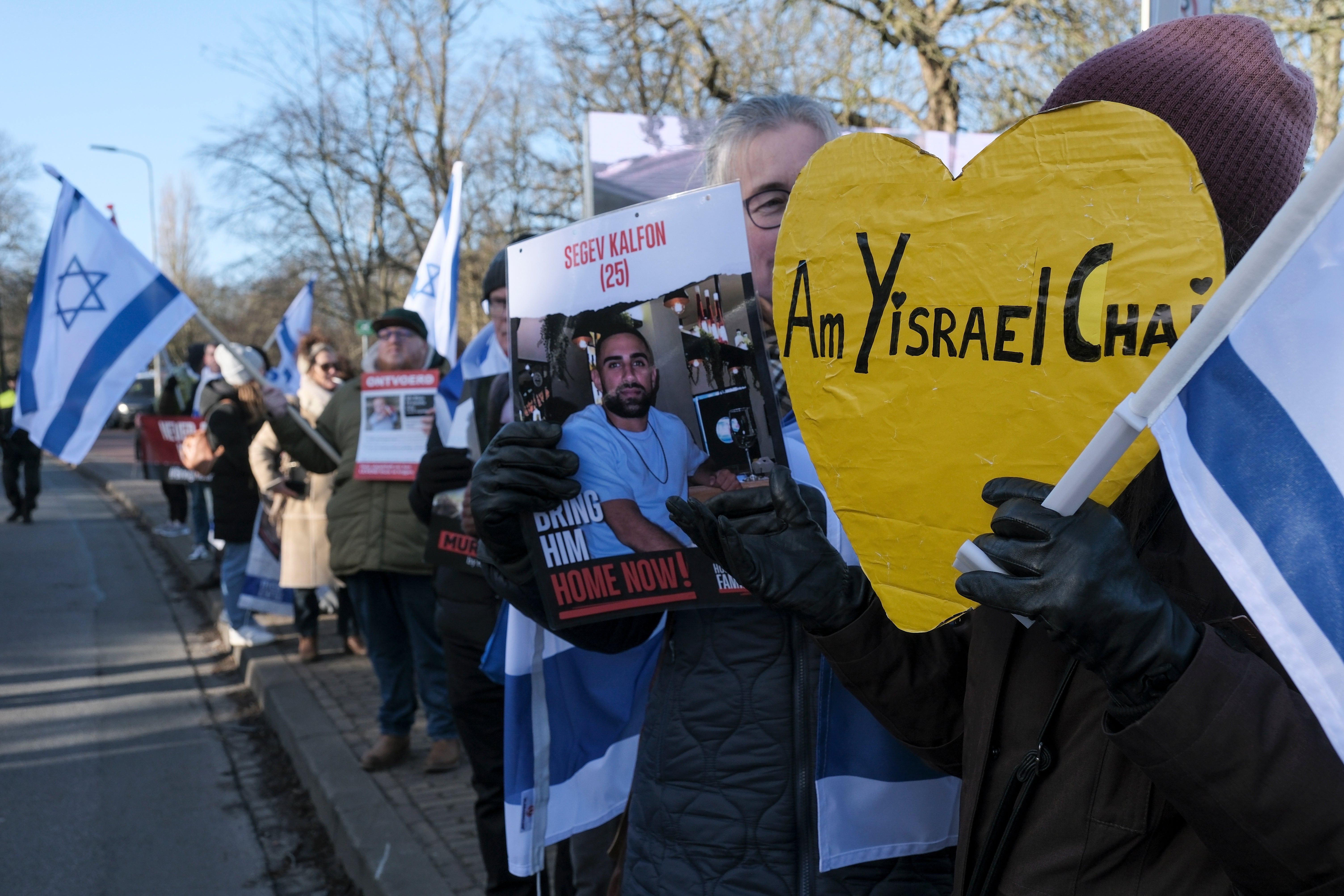 Pro-Israel activists gather near the International Court of Justice in The Hague