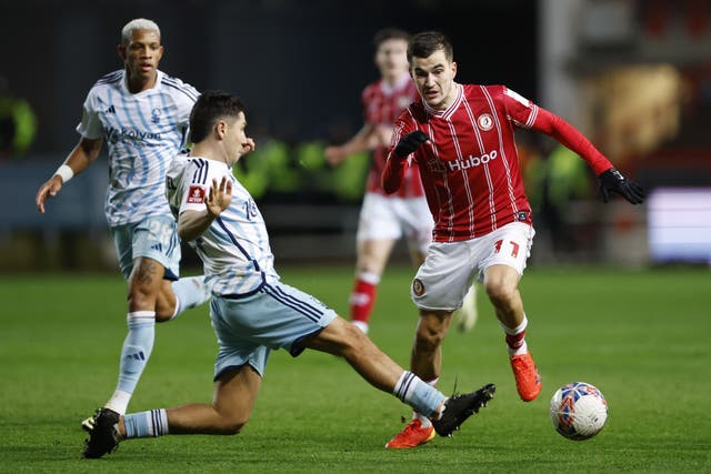 Nottingham Forest’s Gonzalo Montiel (left) and Bristol City’s Anis Mehmeti battle for the ball at Ashton Gate (Nigel French/PA)