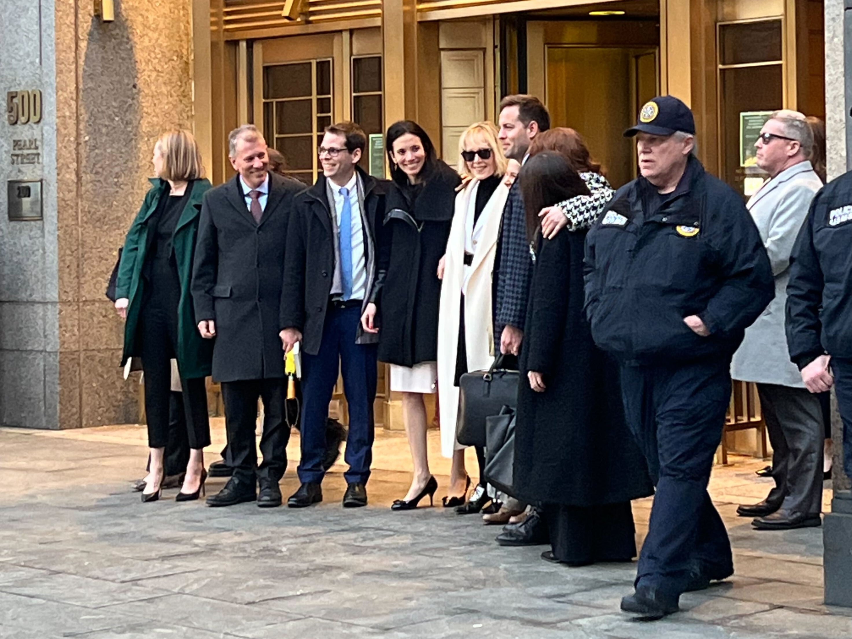 E Jean Carroll and her legal team leave court after a jury awarded her $83m in defamation damages in the case she brought against Donald Trump