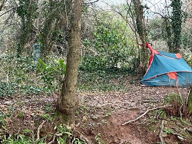 <p>Fire damage can be seen at the bottom of the tent where Chris was injured</p>