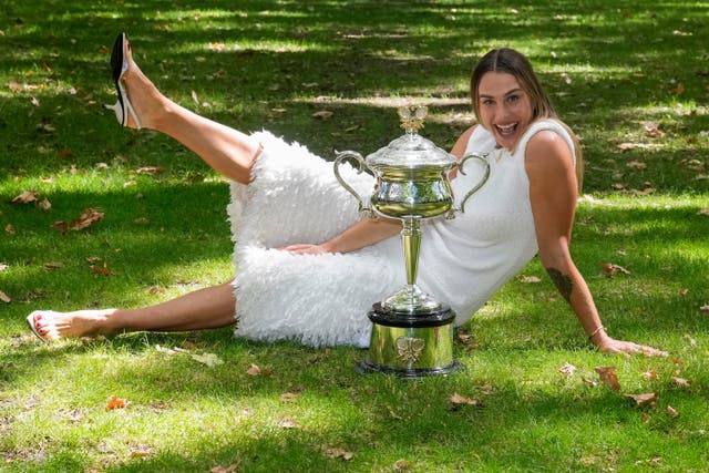 <p>Aryna Sabalenka poses with the Daphne Akhurst Memorial Cup</p>