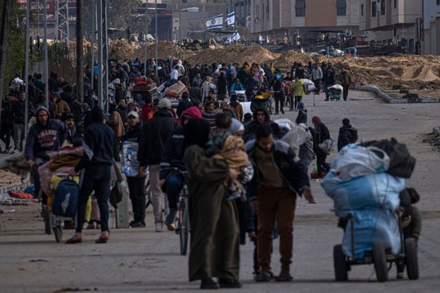 Palestinians flee the Israeli ground offensive in Kahn Younis in the Gaza Strip (Fatima Shbair/AP/PA)