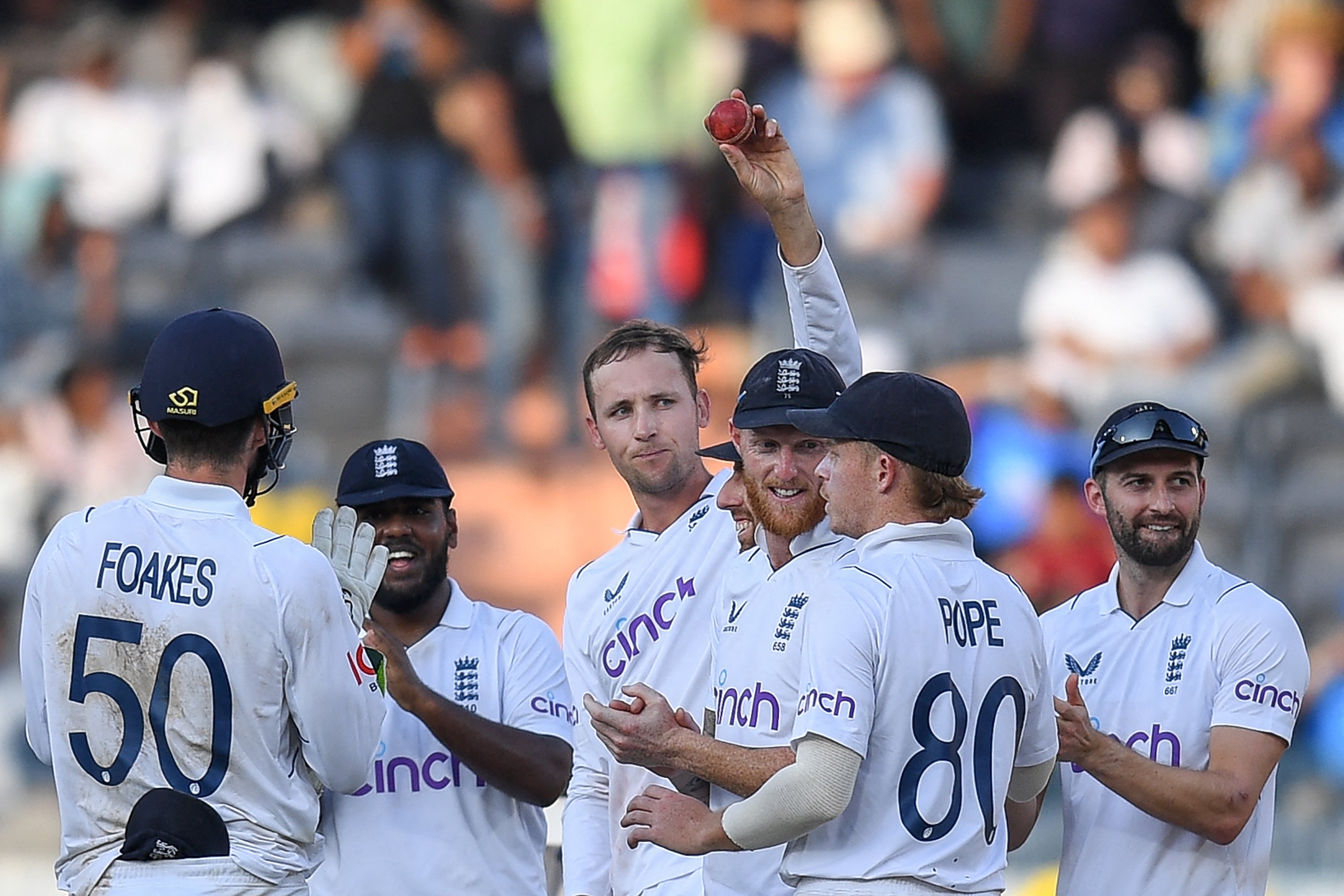 England's Tom Hartley, ball in hand, celebrates after taking a five-wicket haul during the fourth day of the first Test between India and England