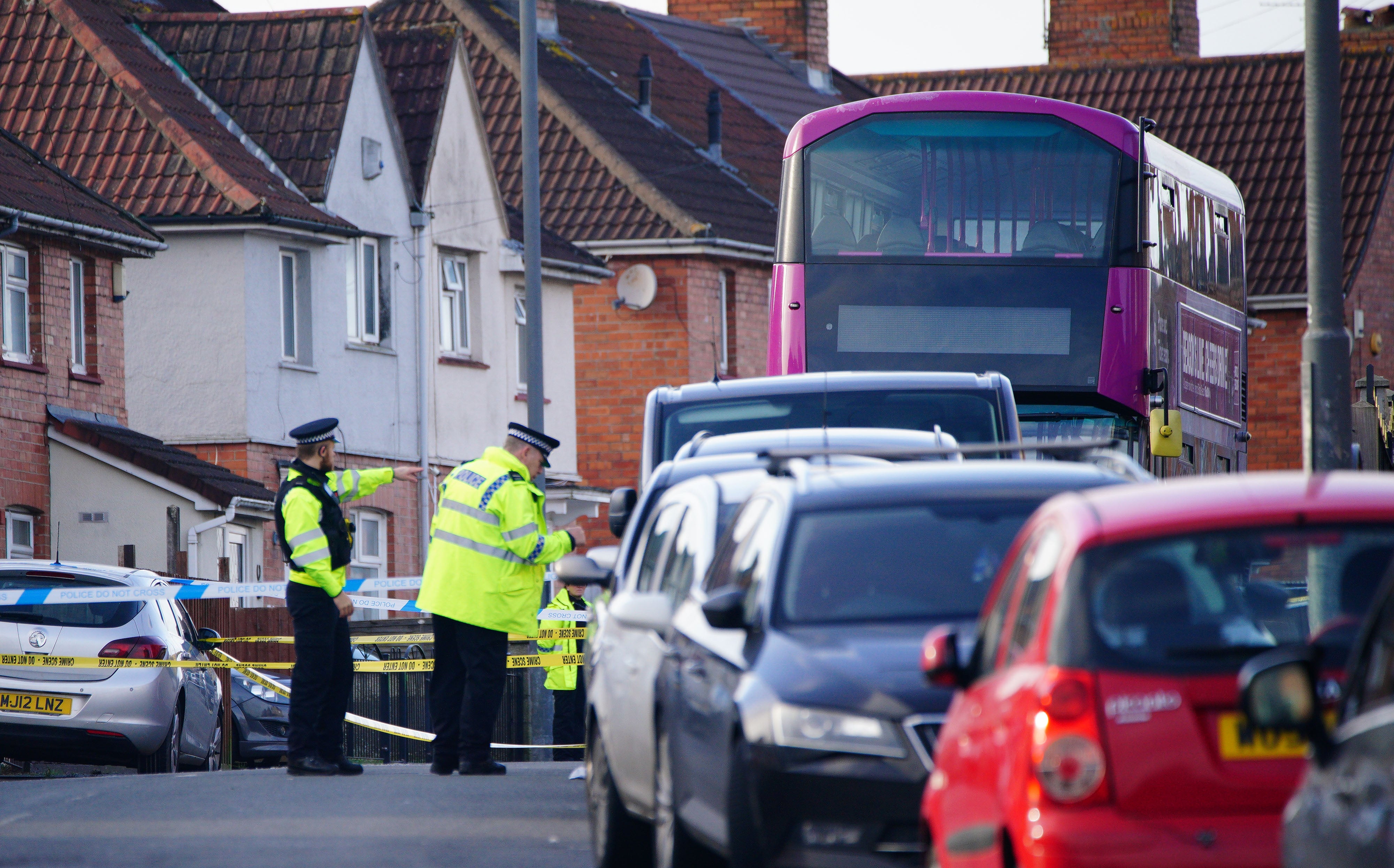 Police at the scene in south Bristol where two teenage boys, aged 15 and 16, died