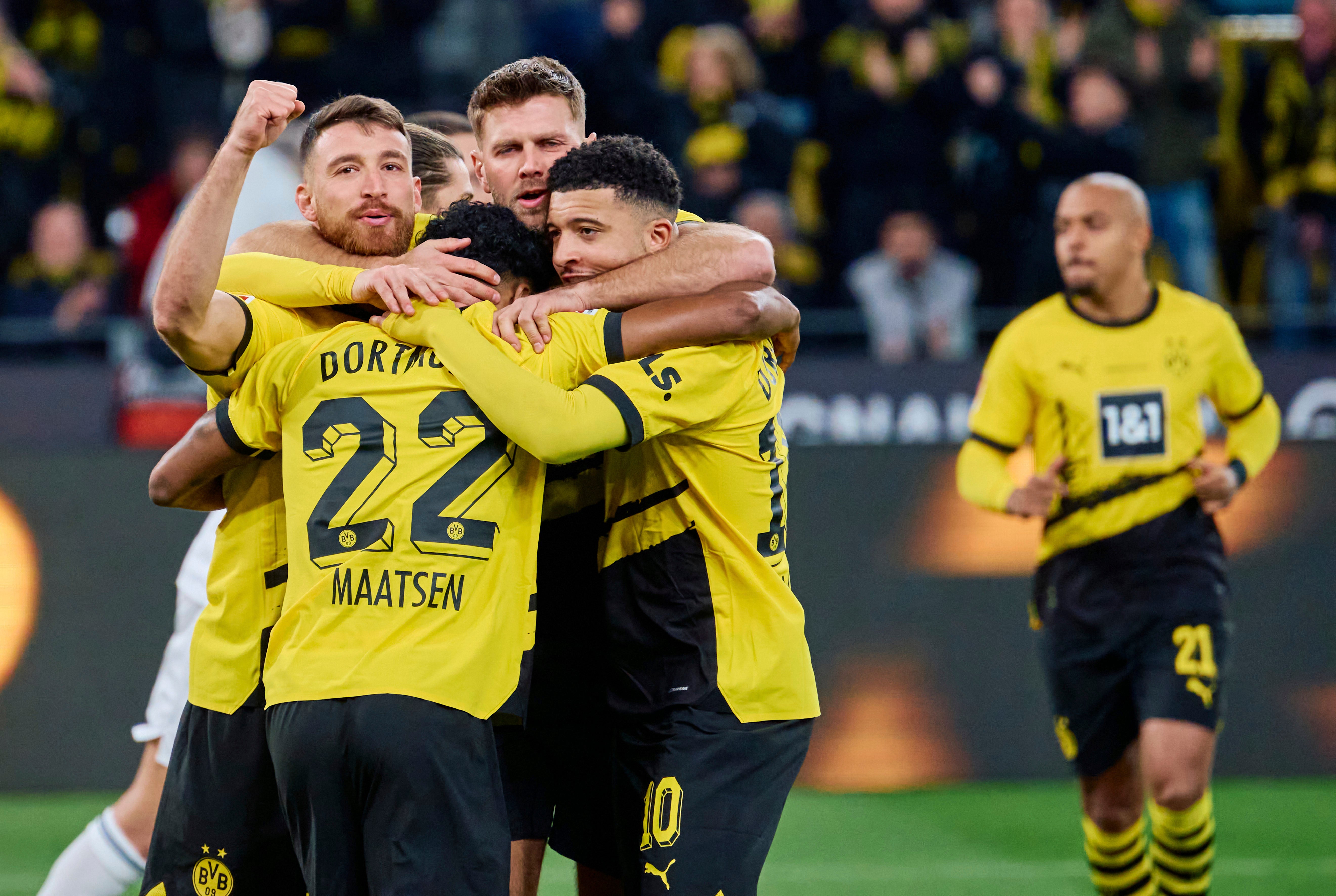 Niclas Fullkrug celebrates with his Dortmund teammates