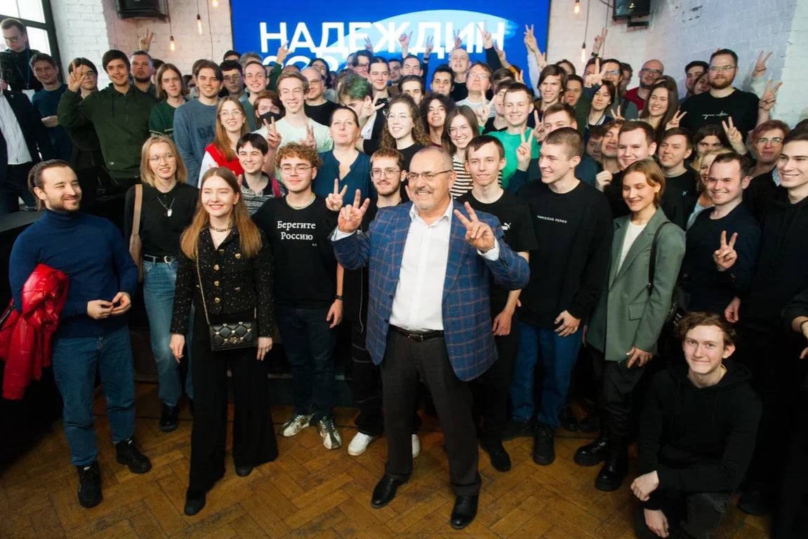 Mr Nadezhdin poses with supporters during an unannounced event in Moscow