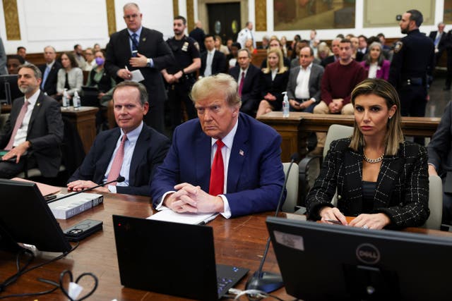 <p>Former US president Donald Trump, with lawyers Christopher Kise and Alina Habba</p>