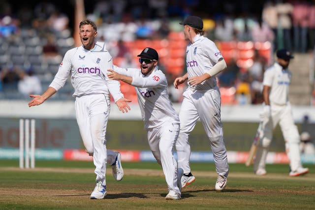 England’s Joe Root, left, celebrates the wicket of India’s KL Rahul (Mahesh Kumar A/AP)